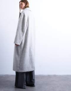 Model wearing Brushed unlined dropped shoulder clean chuck on coat with wool in grey marl