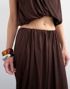 Model wearing Bubble drape skirt in chocolate