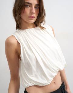 Model wearing Bubble drape top in ivory