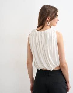 Model wearing Bubble drape top in ivory