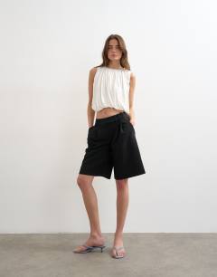 Model wearing Bubble drape top in ivory