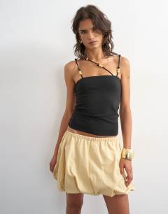 Model wearing Bubble hem mini skirt in stone