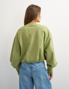 Model wearing Bubble hem sweat in washed sage