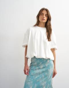 Model wearing Bubble hem tee in ivory