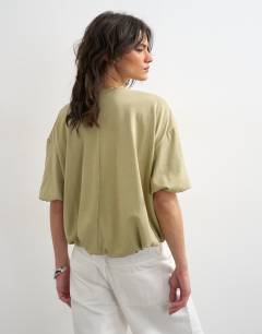 Model wearing Bubble hem tee in taupe