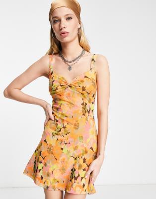 Topshop - Buntes Jersey-Minikleid aus Netzstoff mit verdrehter Vorderseite und großem Blumenmuster-Blau