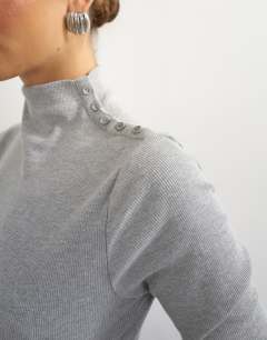 Model wearing Button detail funnel neck long sleeve top in grey marl