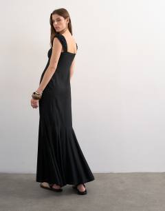 Model wearing Button front cap sleeve maxi sundress in black