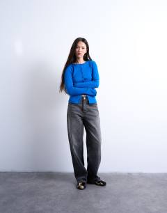 Model wearing Button through cardigan top in cobalt blue
