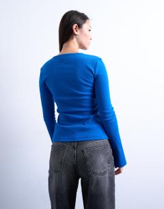 Model wearing Button through cardigan top in cobalt blue