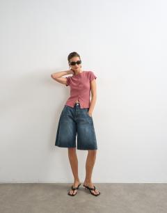 Model wearing Button through short sleeve top in berry