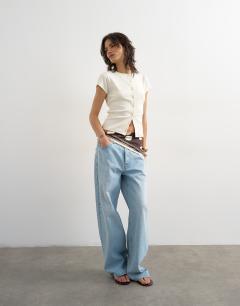 Model wearing Button through short sleeve top in ecru