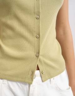 Model wearing Button through short sleeve top in khaki