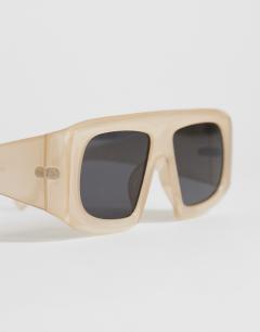 Model wearing Cairo chunky square sunglasses in off white