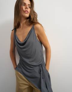 Model wearing Cami asymmetric top in black