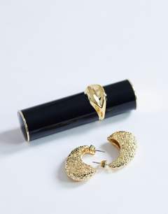 Model wearing Camille textured stud earring in gold tone