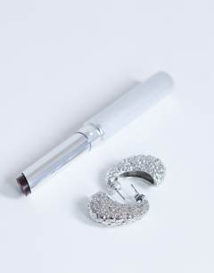 Model wearing Camille textured stud earring in silver tone