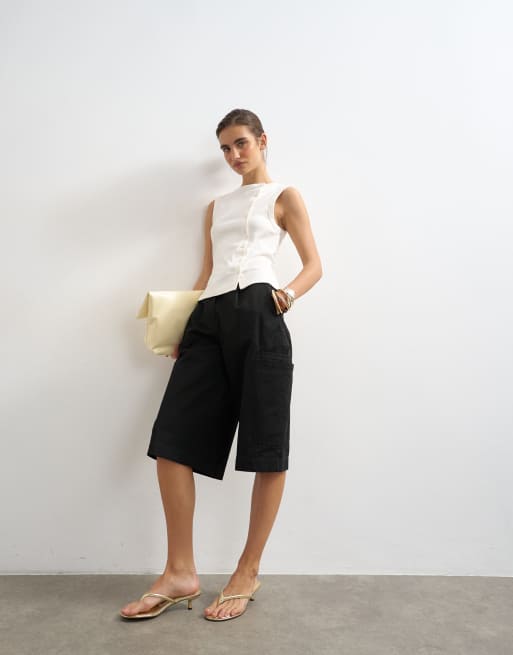 Topshop - Camiseta color marfil sin mangas abotonada