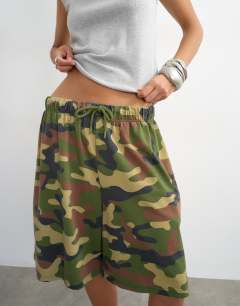 Model wearing Camouflage washed long line tie detail shorts in khaki