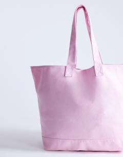 Model wearing Canvas tote bag in pink