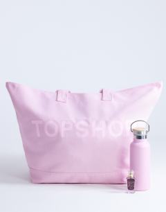 Model wearing Canvas tote bag in pink