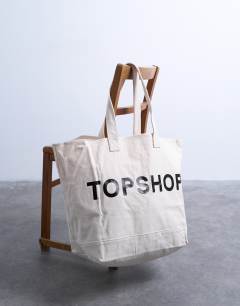 Model wearing Canvas tote bag in white