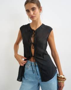 Model wearing Cap sleeve asymmetric tie detail top in black