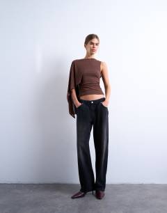 Model wearing Cape detail sleeveless top in chocolate brown