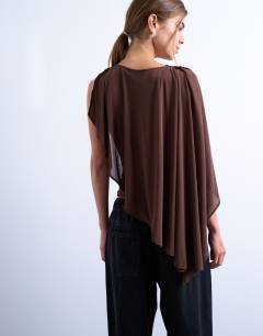 Model wearing Cape detail sleeveless top in chocolate brown