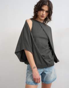 Model wearing Cape draped tee in charcoal