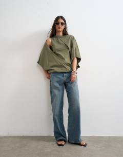 Model wearing Cape draped tee in khaki