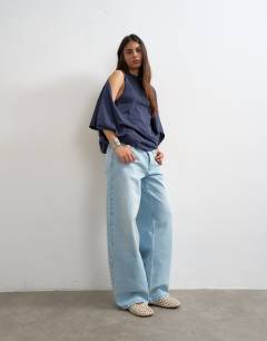 Model wearing Cape draped tee in navy