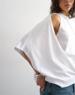 Model wearing Cape draped tee in white
