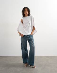 Model wearing Cape draped tee in white