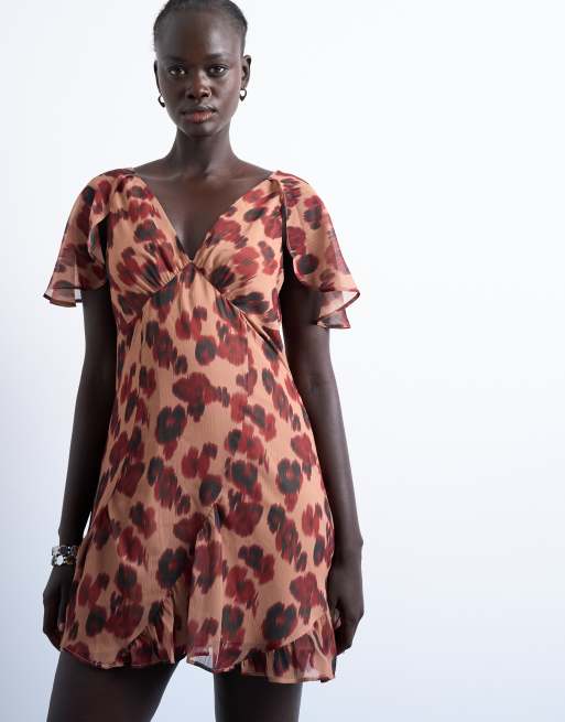 Topshop cape sleeve godet hem mini dress in modern print