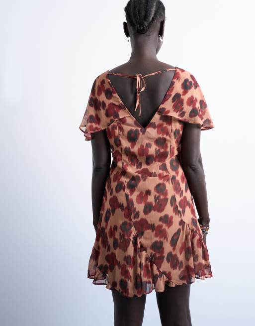 Topshop cape sleeve godet hem mini dress in modern print