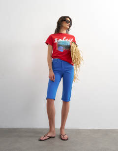 Model wearing Capri comfort stretch jean in cobalt