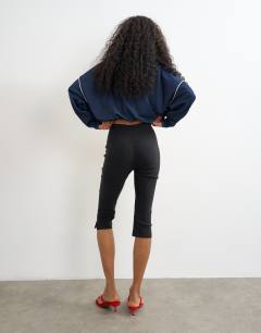 Model wearing Capri trouser in black