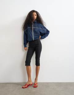 Model wearing Capri trouser in black