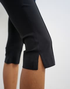 Model wearing Capri trouser in black