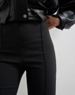 Model wearing Capri trouser in black