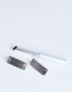 Model wearing Carmen rectangle stud earring in silver tone