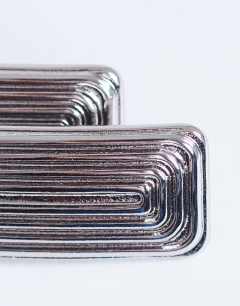 Model wearing Carmen rectangle stud earring in silver tone