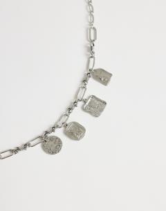 Model wearing Casidy waterproof stainless steel chain bracelet with charms in silver