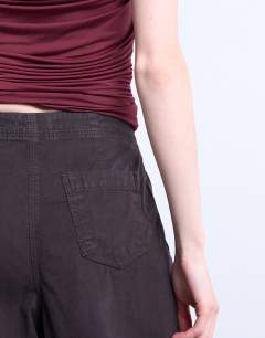 Model wearing Casual barrel flag trouser in chocolate