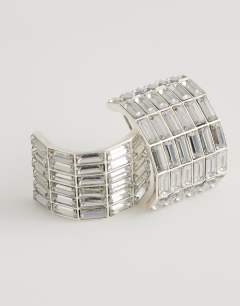 Model wearing Celeste diamante hoop earrings in silver