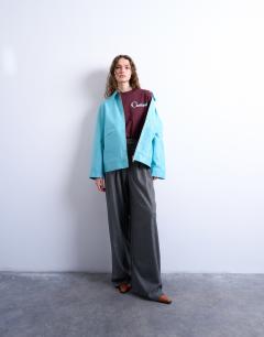 Model wearing Chamonix graphic boxy long sleeve tee in burgundy