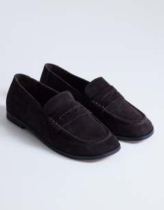 Model wearing Charlie real leather flat loafer in chocolate suede