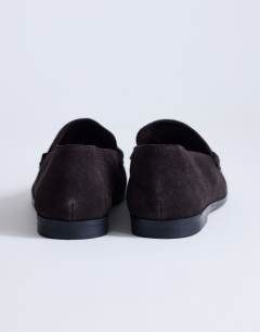 Model wearing Charlie real leather flat loafer in chocolate suede