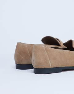 Model wearing Charlie real suede flat loafer in camel 